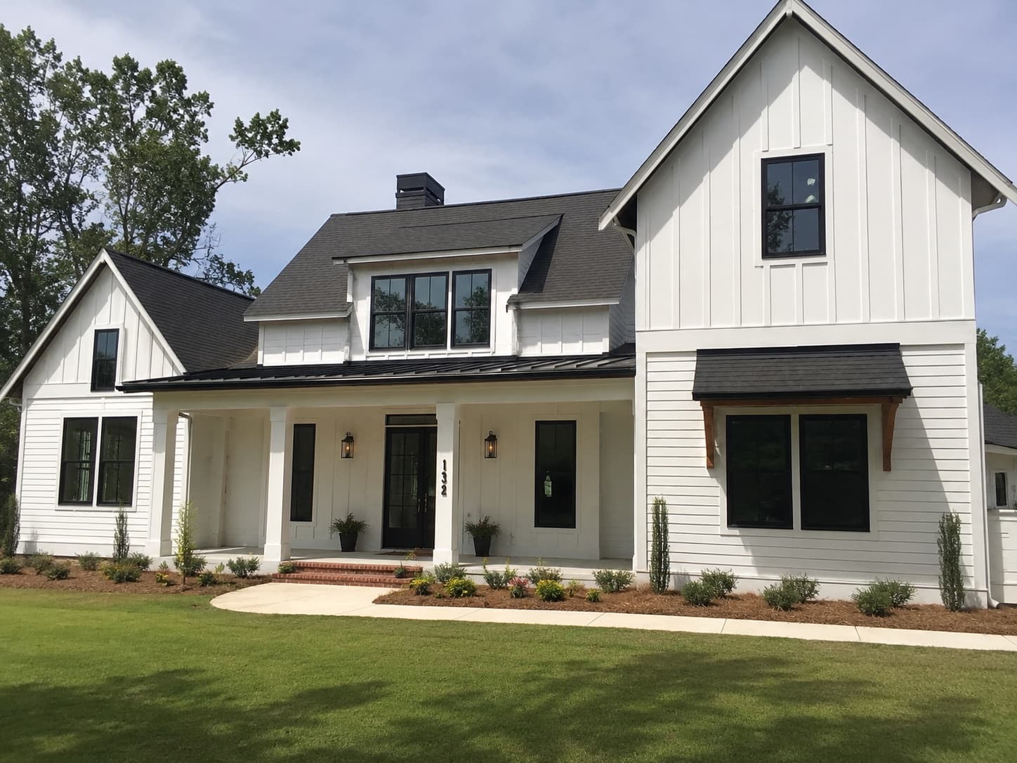 Custom-build modern farmhouse two-coat exterior in Lexington